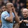 Manchester City's Vincent Kompany reacts after being sent off by referee Lee Mason during their English Premier League soccer match against Hull City in Hull
